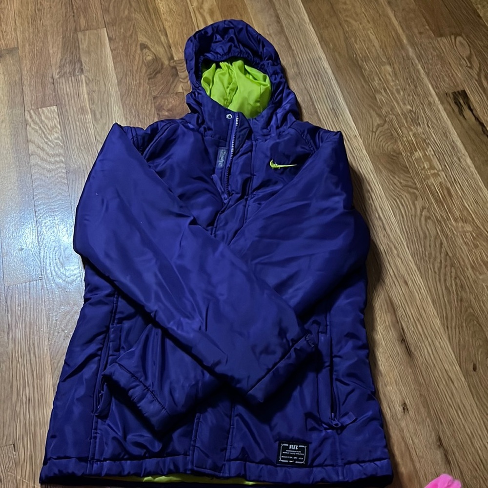 pink and lime green nike coat with double zip up